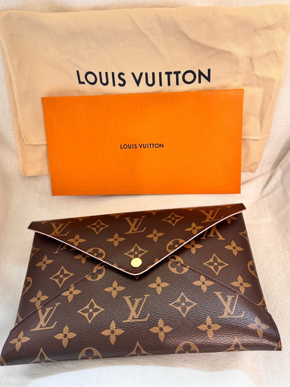 Authentic Louis Vuitton Monogram Kirigamy Large Pochette Convertible Crossbody.